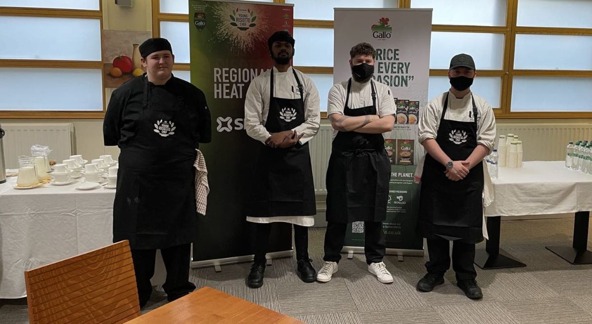 Student competitors in catering attire with SERC Winner Thomas Disney, left.